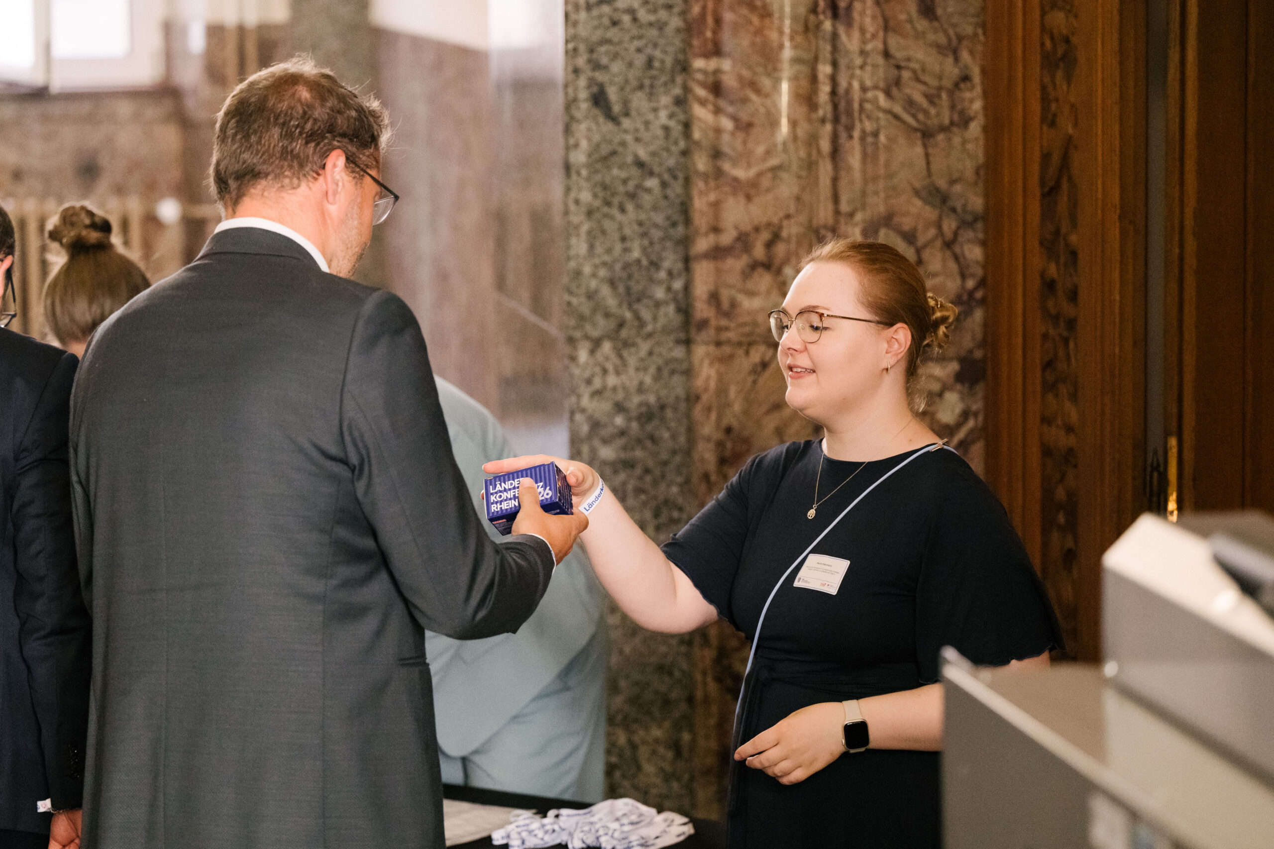 Teilnehmer bei der Registrierung Teilnehmer bei der Registrierung
